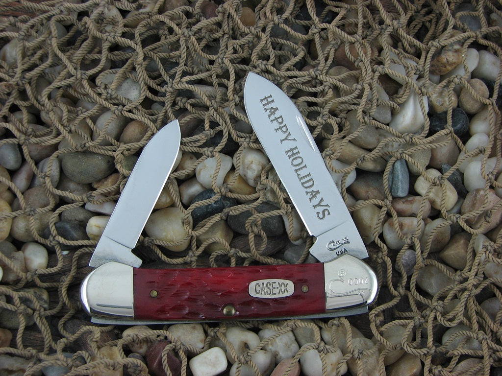 Case Cutlery Seasons Greetings 1996 Red Jigged Bone Canoe with TruSharp steel 62131 Mint