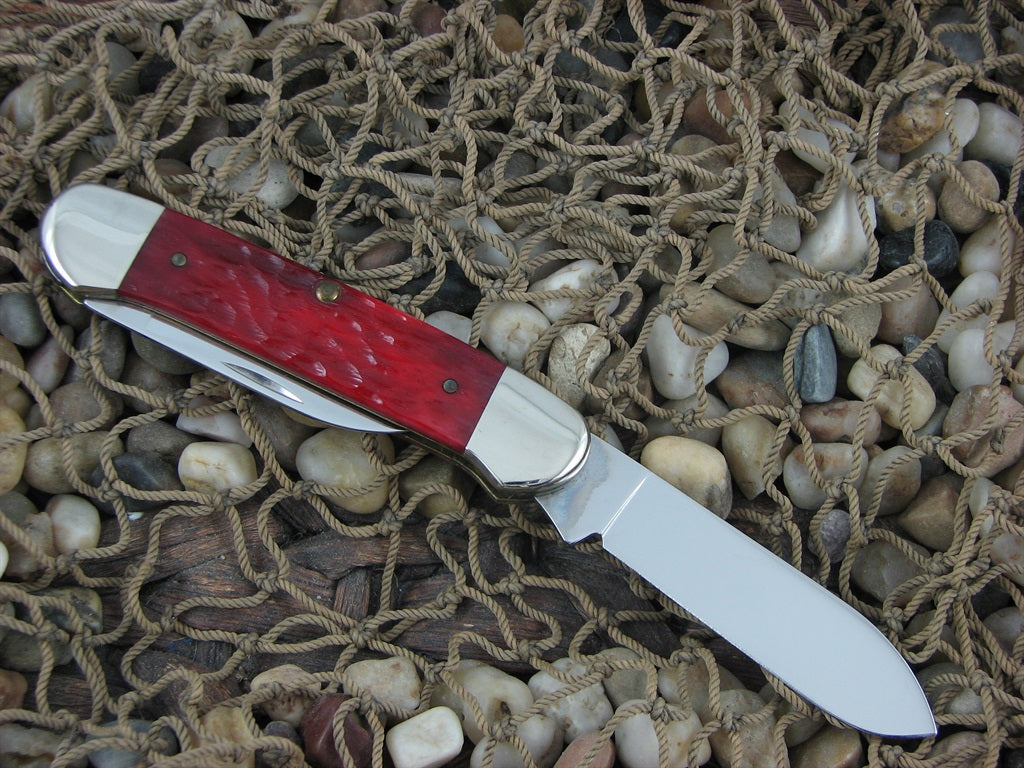 Case Cutlery Seasons Greetings 1996 Red Jigged Bone Canoe with TruSharp steel 62131 Mint