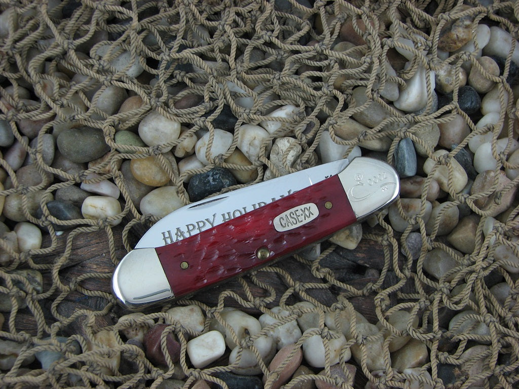 Case Cutlery Seasons Greetings 1996 Red Jigged Bone Canoe with TruSharp steel 62131 Mint