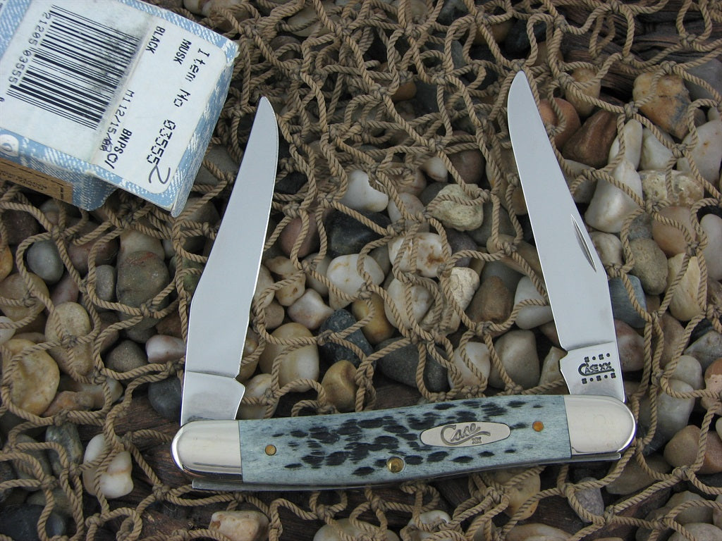 Case XX 2001 Black Pocketworn Bone Muskrat with TruSharp steel  03555