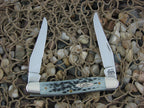 Case XX 2001 Black Pocketworn Bone Muskrat with TruSharp steel  03555