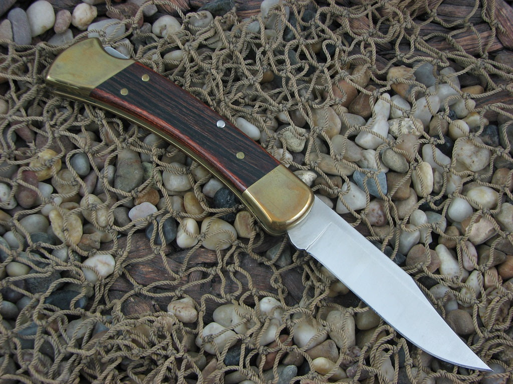 Buck Knives 2008 Wood Folding Hunter with Stainless steel Model 110