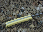 W.R. Case  Yellow Delrin Sodbuster Jr with Carbon steel 3137 00032