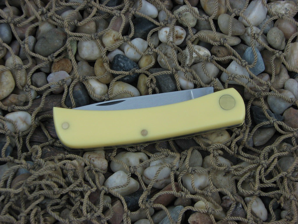 W.R. Case  Yellow Delrin Sodbuster Jr with Carbon steel 3137 00032