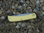 W.R. Case  Yellow Delrin Sodbuster Jr with Carbon steel 3137 00032