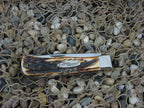 Case XX Classic 1993 Zipper Burnt Stag Bullet Trapper with Carbon steel 5223